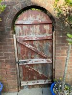 door old and withered before restoration