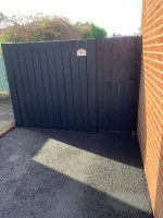 Cleaned and repainted fence