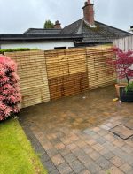 fence rebuilt and restored