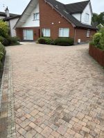 yard driveway after cleaning power hose drying