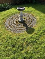 garden ornament dirty before power wash