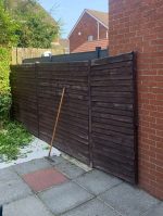old fence ready to be removed and replaced